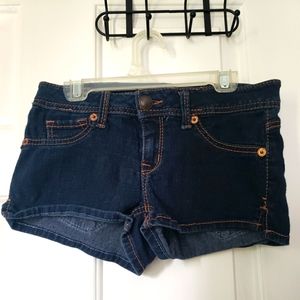 Fragile dark denim shorts